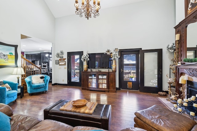 314 W 6th St Unit 7, Columbia, TN 38401 - living area with high vaulted ceiling, hardwood / wood-style floors, a chandelier, and stairs