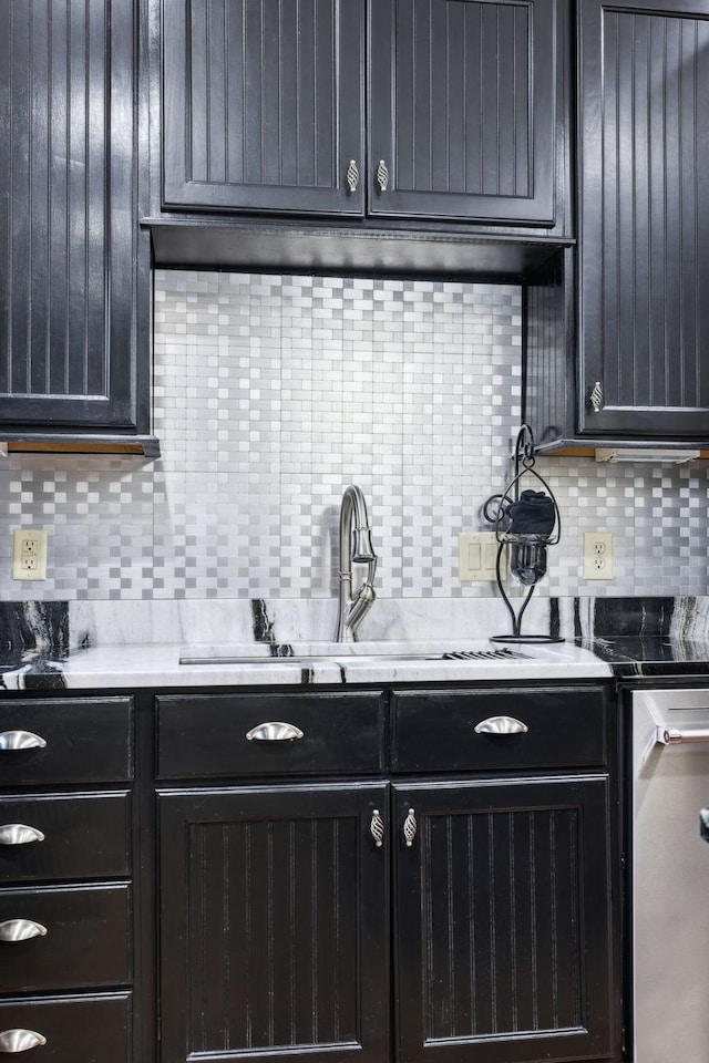 314 W 6th St Unit 7, Columbia, TN 38401 - kitchen featuring backsplash, light countertops, and a sink