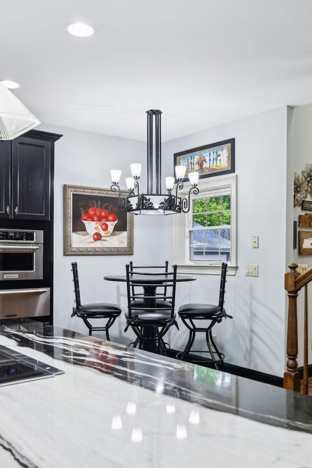 314 W 6th St Unit 7, Columbia, TN 38401 - dining space featuring a chandelier