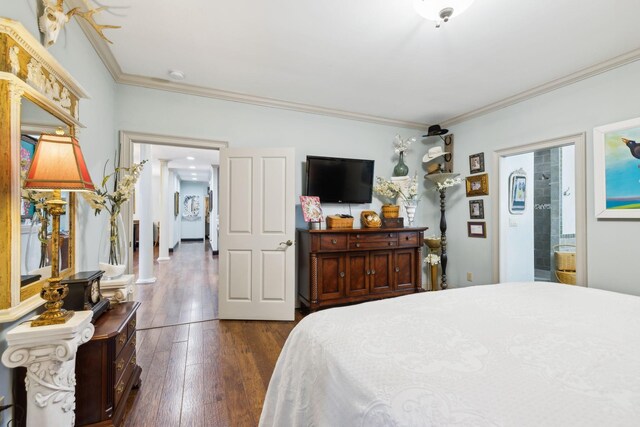 314 W 6th St Unit 7, Columbia, TN 38401 - bedroom featuring ornamental molding and dark wood-style floors