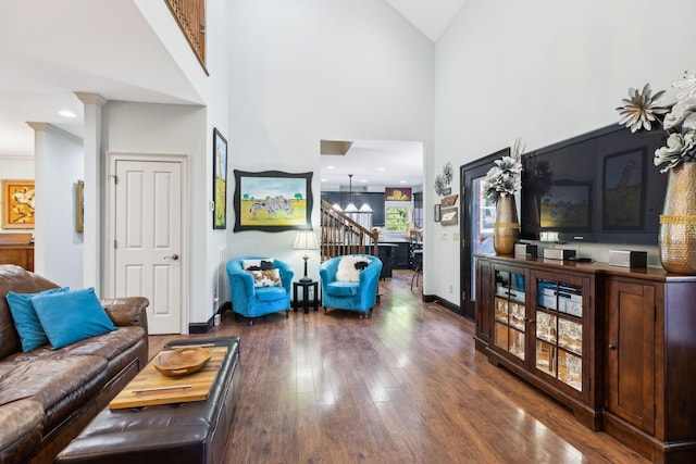 314 W 6th St Unit 7, Columbia, TN 38401 - living room featuring hardwood / wood-style flooring, baseboards, and a high ceiling