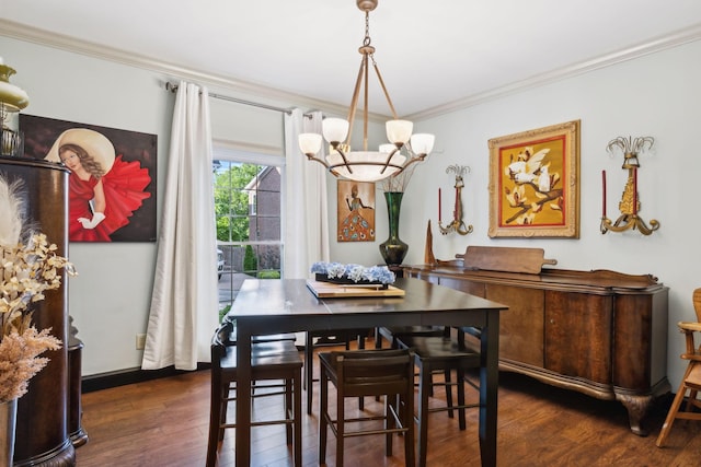 314 W 6th St Unit 7, Columbia, TN 38401 - dining space featuring a chandelier, crown molding, and wood finished floors