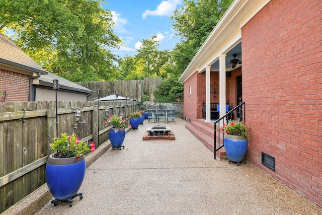 314 W 6th St Unit 7, Columbia, TN 38401 - view of patio featuring an outdoor fire pit