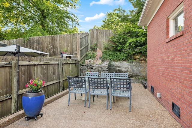 314 W 6th St Unit 7, Columbia, TN 38401 - fenced backyard featuring outdoor dining area and a patio area