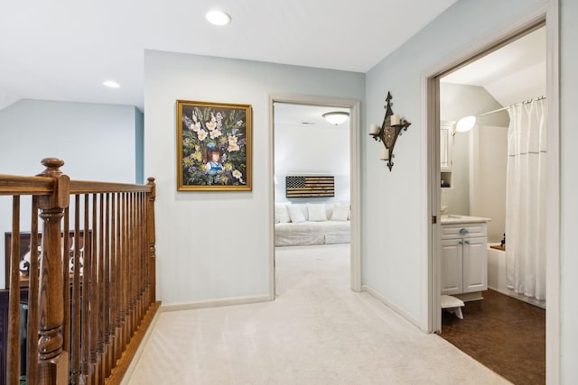 314 W 6th St Unit 7, Columbia, TN 38401 - hall with vaulted ceiling, carpet flooring, recessed lighting, an upstairs landing, and baseboards