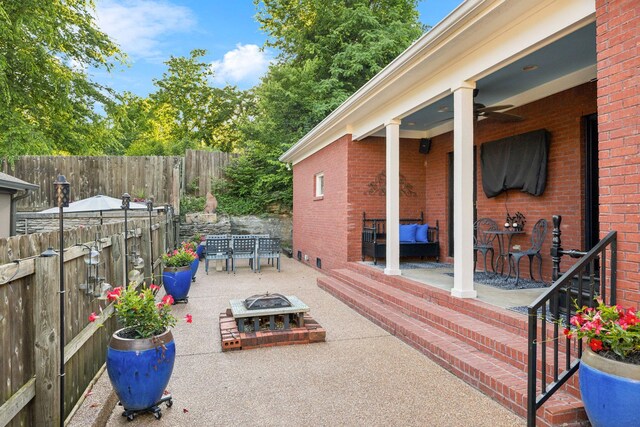 314 W 6th St Unit 7, Columbia, TN 38401 - view of patio / terrace with a fire pit, ceiling fan, and outdoor dining area