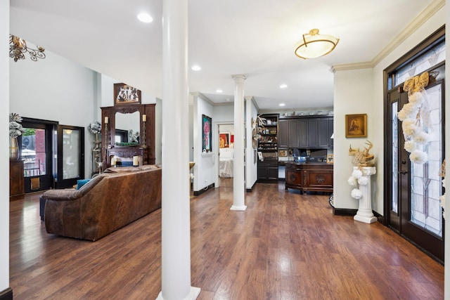 314 W 6th St Unit 7, Columbia, TN 38401 - foyer with ornate columns, crown molding, dark wood finished floors, baseboards, and recessed lighting