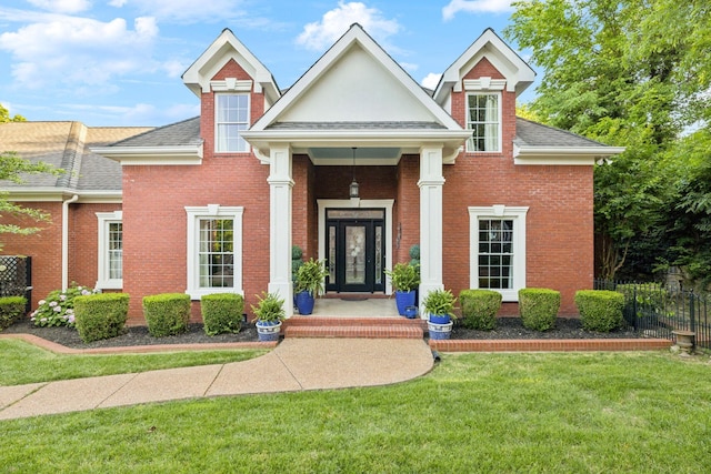 314 W 6th St Unit 7, Columbia, TN 38401 - neoclassical home with brick siding and a shingled roof