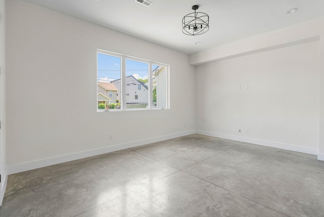 713B 32nd Ave N, Nashville, TN 37209 - empty room with concrete floors and baseboards