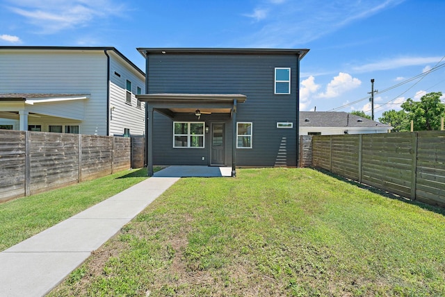 713B 32nd Ave N, Nashville, TN 37209 - back of property with a patio area and a ceiling fan