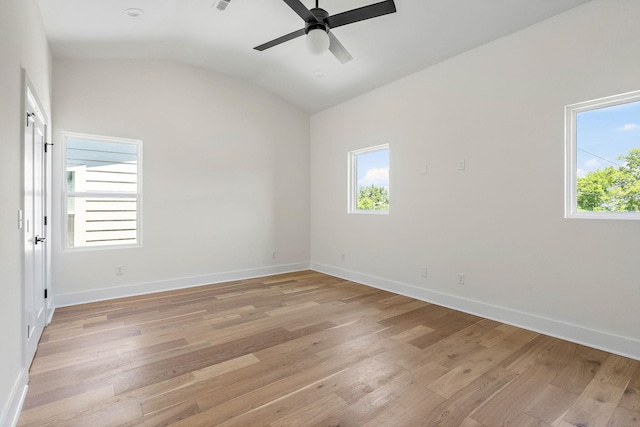 713B 32nd Ave N, Nashville, TN 37209 - empty room with healthy amount of natural light, lofted ceiling, light wood-style flooring, a ceiling fan, and baseboards
