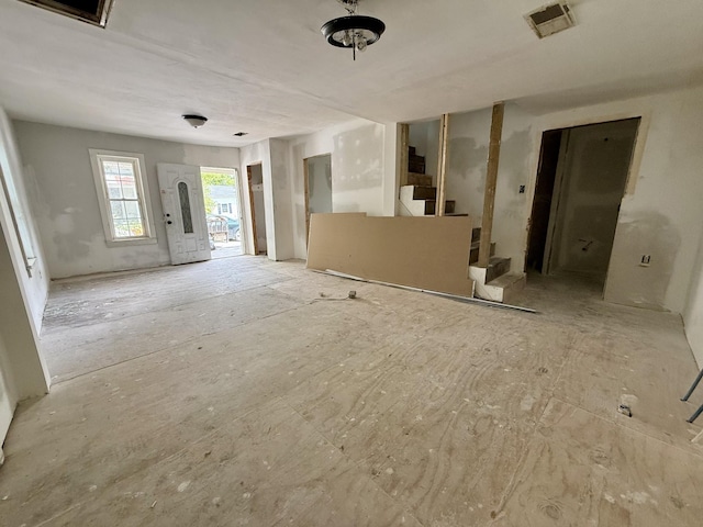 10261/2 Bridge St, Columbia, TN 38401 - unfurnished living room featuring stairs