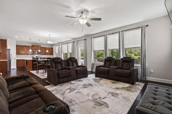 372 Old Stone Rd, Goodlettsville, TN 37072 - living room with baseboards, a ceiling fan, and wood finished floors