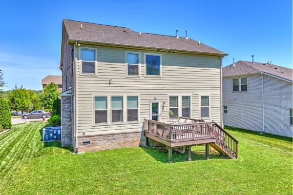 372 Old Stone Rd, Goodlettsville, TN 37072 - rear view of property with a wooden deck and a lawn
