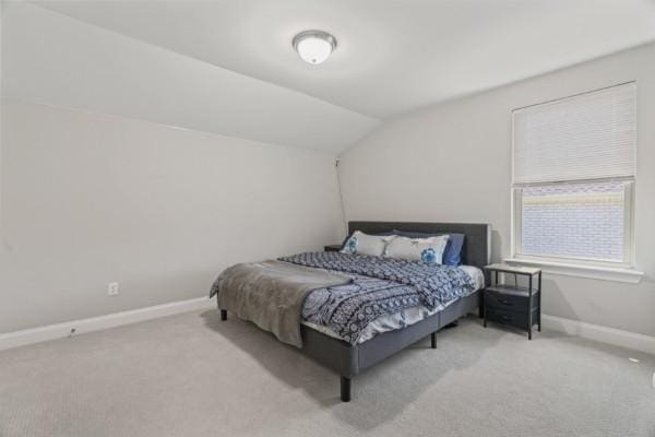 372 Old Stone Rd, Goodlettsville, TN 37072 - carpeted bedroom featuring lofted ceiling and baseboards