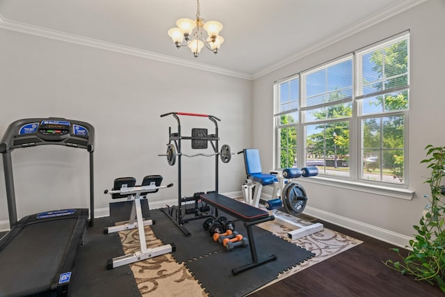 372 Old Stone Rd, Goodlettsville, TN 37072 - exercise room featuring baseboards, crown molding, a chandelier, and wood finished floors