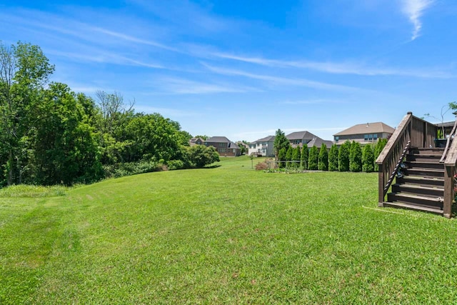 372 Old Stone Rd, Goodlettsville, TN 37072 - view of green lawn with stairs and a wooden deck