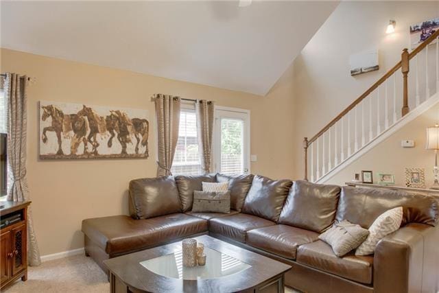 1602 Zurich Dr, Spring Hill, TN 37174 - living area with stairs, light carpet, and vaulted ceiling