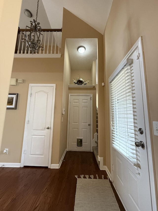 1602 Zurich Dr, Spring Hill, TN 37174 - foyer entrance featuring baseboards, wood finished floors, a chandelier, stairway, and high vaulted ceiling