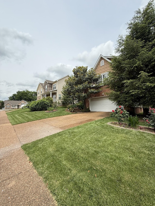 1602 Zurich Dr, Spring Hill, TN 37174 - view of front of home with driveway, a front yard, and an attached garage