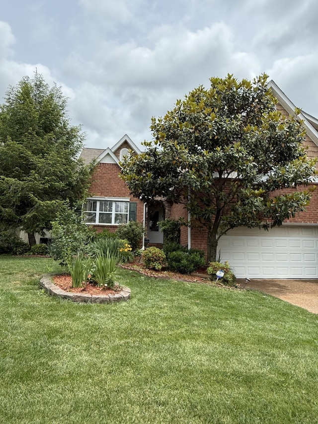 1602 Zurich Dr, Spring Hill, TN 37174 - view of property hidden behind natural elements with driveway, a front lawn, brick siding, and a garage