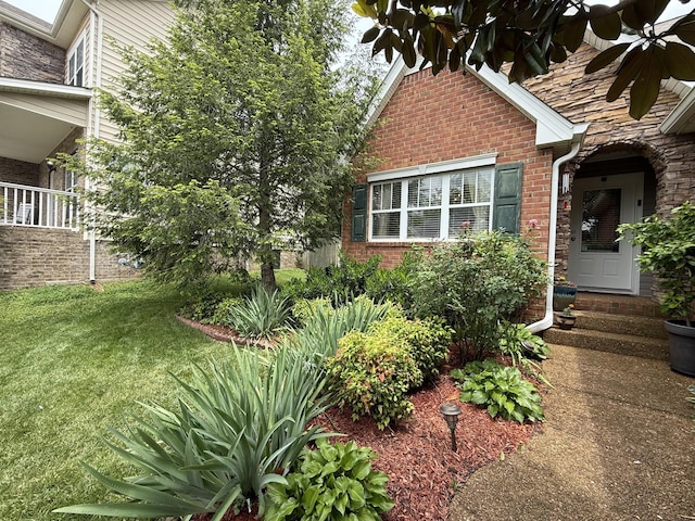 1602 Zurich Dr, Spring Hill, TN 37174 - property entrance featuring brick siding and a lawn