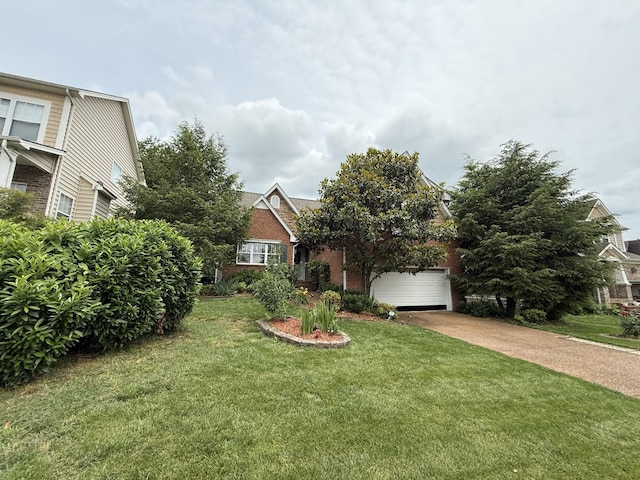 1602 Zurich Dr, Spring Hill, TN 37174 - obstructed view of property featuring brick siding, a front lawn, concrete driveway, and an attached garage
