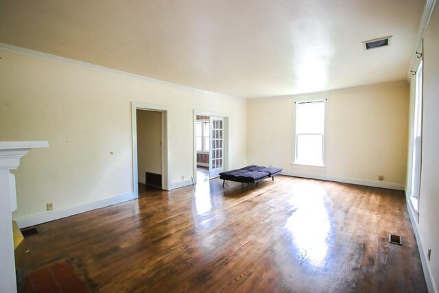 112 N Church St, Sparta, TN 38583 - spare room with wood finished floors, ornamental molding, and baseboards