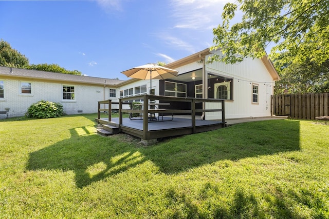 203 Hesta St, Spring Hill, TN 37174 - back of house featuring a wooden deck and a sunroom