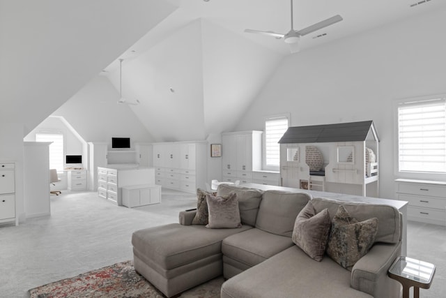 1936 Silver Fox Rd, Thompsons Station, TN 37179 - living area with light colored carpet, vaulted ceiling, and ceiling fan