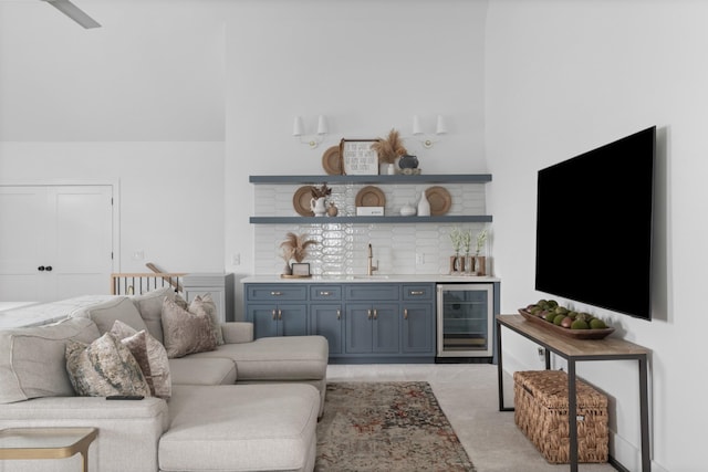 1936 Silver Fox Rd, Thompsons Station, TN 37179 - living area with wine cooler, wet bar, and light colored carpet