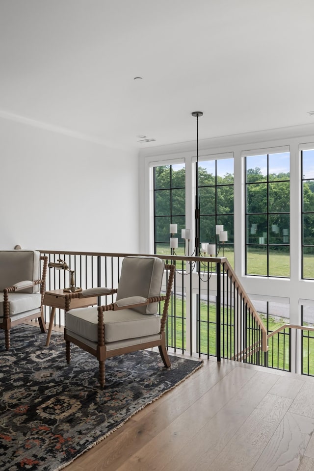 1936 Silver Fox Rd, Thompsons Station, TN 37179 - sitting room with wood finished floors and healthy amount of natural light