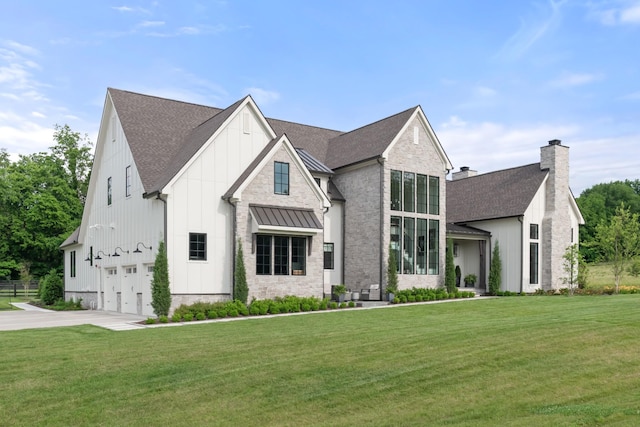 1936 Silver Fox Rd, Thompsons Station, TN 37179 - modern farmhouse style home with board and batten siding, an attached garage, concrete driveway, and a front yard