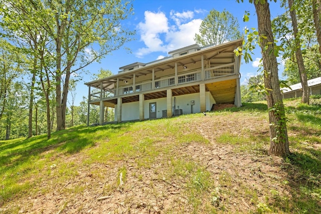 4221 New Hope Rd, Celina, TN 38551 - rear view of house featuring a wooden deck and cooling unit