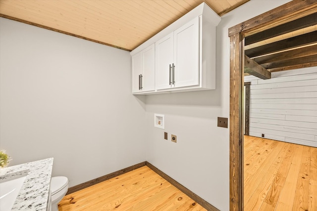 4221 New Hope Rd, Celina, TN 38551 - laundry room with electric dryer hookup, light wood finished floors, hookup for a washing machine, baseboards, and wooden ceiling