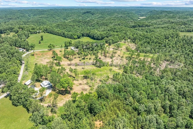 4221 New Hope Rd, Celina, TN 38551 - aerial view of property and surrounding area featuring a heavily wooded area