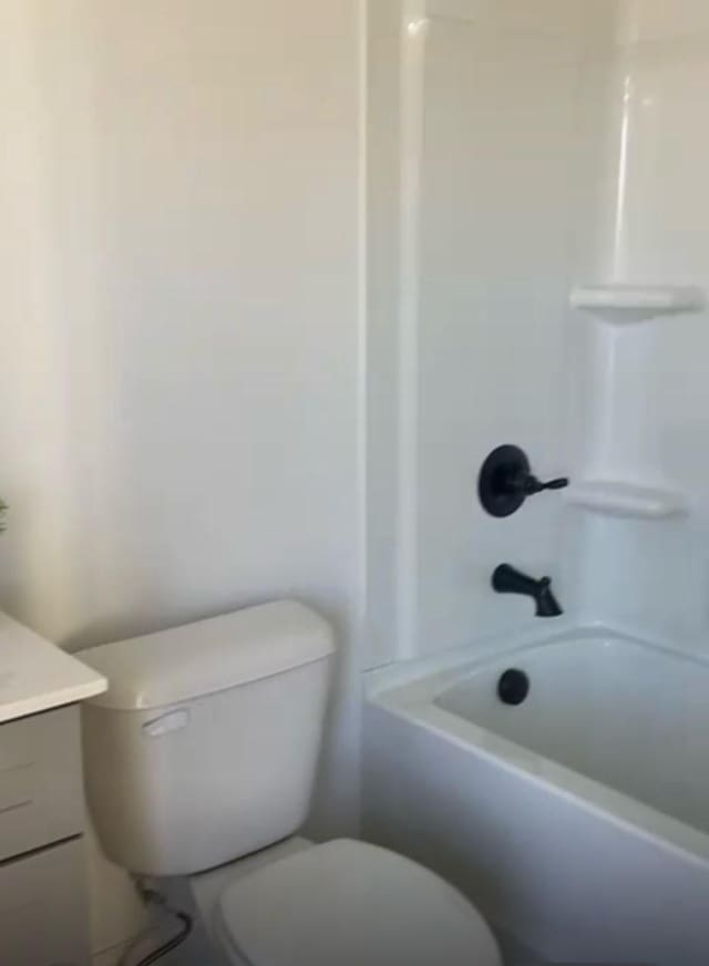 362 Baldwin Ln, Springfield, TN 37172 - full bathroom with vanity, toilet, and bathtub / shower combination