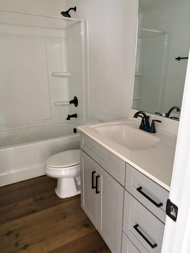 362 Baldwin Ln, Springfield, TN 37172 - bathroom with vanity, wood finished floors, toilet, and bathing tub / shower combination