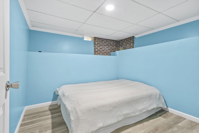 109 Garwood Dr, Nashville, TN 37210 - bedroom featuring wood finished floors, baseboards, a paneled ceiling, ornamental molding, and recessed lighting