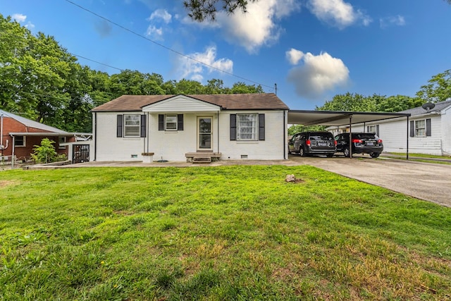 109 Garwood Dr, Nashville, TN 37210 - view of front of home with a carport, a front lawn, and driveway