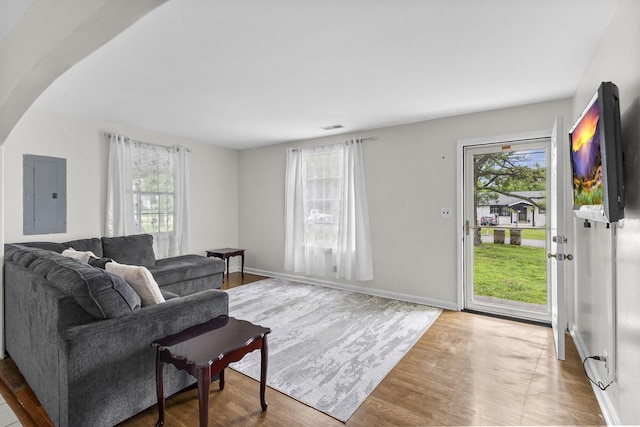 109 Garwood Dr, Nashville, TN 37210 - living area with electric panel, plenty of natural light, wood finished floors, and baseboards