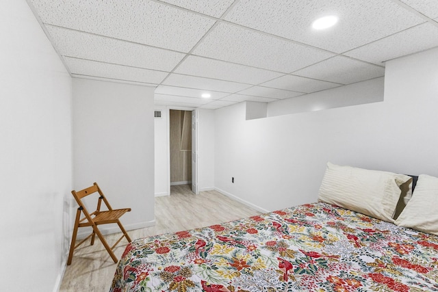 109 Garwood Dr, Nashville, TN 37210 - bedroom with light wood-style floors, baseboards, recessed lighting, and a paneled ceiling