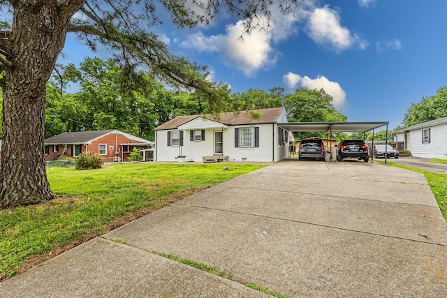 109 Garwood Dr, Nashville, TN 37210 - view of front of property with concrete driveway, a front yard, and a carport