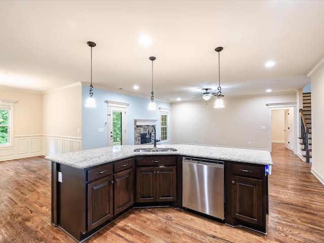 1116 Rivercrest Dr, Murfreesboro, TN 37129 - kitchen featuring dishwasher, a sink, open floor plan, dark brown cabinets, and crown molding