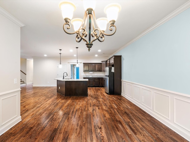 1116 Rivercrest Dr, Murfreesboro, TN 37129 - kitchen featuring freestanding refrigerator, a sink, dark brown cabinets, ornamental molding, and light countertops