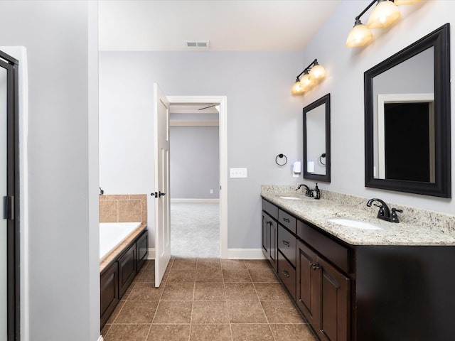 1116 Rivercrest Dr, Murfreesboro, TN 37129 - bathroom featuring double vanity, a garden tub, baseboards, and tile patterned floors