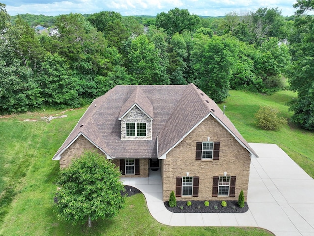 1116 Rivercrest Dr, Murfreesboro, TN 37129 - view of front of house featuring brick siding, a front yard, and roof with shingles