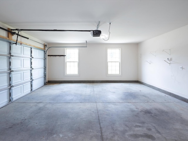 1116 Rivercrest Dr, Murfreesboro, TN 37129 - garage featuring baseboards and a garage door opener