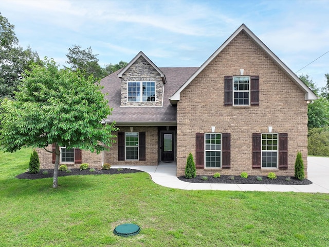 1116 Rivercrest Dr, Murfreesboro, TN 37129 - view of front facade with roof with shingles, a front lawn, and brick siding