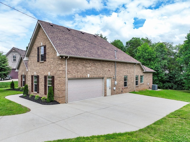 1116 Rivercrest Dr, Murfreesboro, TN 37129 - view of home's exterior featuring concrete driveway, a yard, brick siding, roof with shingles, and cooling unit